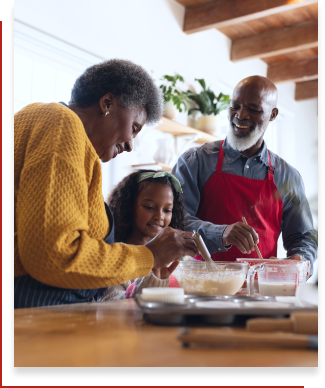 grandparents baking with their granddaughter